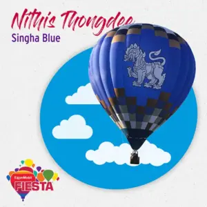 A blue hot air balloon with an intricate lion design floats against a stylized sky background, promoting an ExxomMobil Fiesta event.