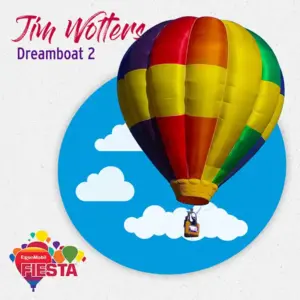 A colorful hot air balloon soars against a blue sky with clouds, featuring branding for ExxonMobil Fiesta and text “Jim Wofford Dreamboat 2.”