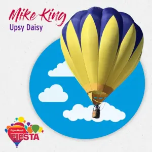 A colorful hot air balloon against a blue sky with white clouds at ExxonMobil Fiesta event. Prominent text reads