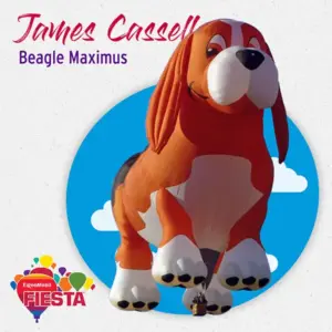 A large, orange beagle-shaped hot air balloon named Beagle Maximus floats in a clear sky. It's part of the ExxonMobil Fiesta event.