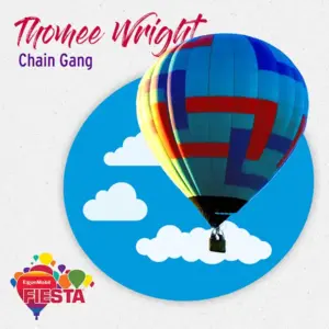 Colorful hot air balloon with a geometric pattern floats against a cloud-dotted blue circle.