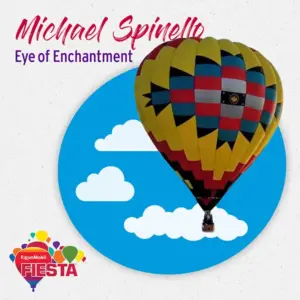 Colorful hot air balloon with a checkered pattern against a blue sky. Text reads