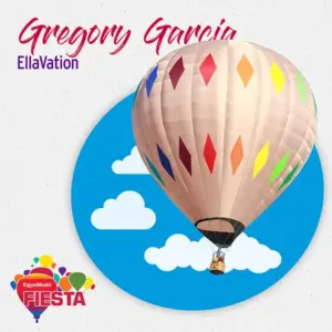 A colorful hot air balloon with a diamond pattern is featured against a blue sky with clouds, promoting the Fiesta event.