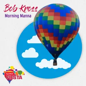 Colorful hot air balloon with checkered pattern against blue sky and clouds.