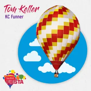 A multicolored hot air balloon flies in a blue sky with clouds, labeled