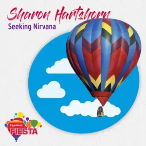 A colorful hot air balloon with a geometric pattern floats against a backdrop of clouds. Text says