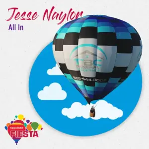 Colorful hot air balloon with business logo floating in blue sky, part of ExxonMobil Fiesta event. Jessie Naylor, All In text visible.