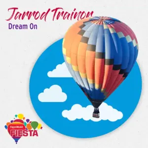 A colorful hot air balloon floats against a blue sky with clouds.