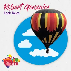 A colorful hot air balloon floats over stylized clouds with