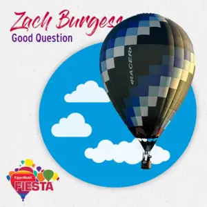 A colorful hot air balloon floats against a blue sky with clouds. The text mentions