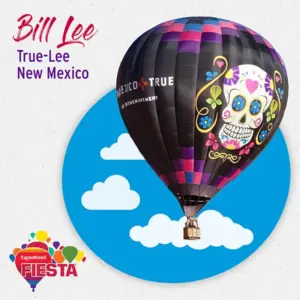 A vibrant hot air balloon with a colorful skull design floats against a blue sky with clouds, promoting New Mexico.