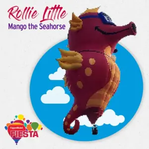 A colorful seahorse-shaped hot air balloon named Mango floats against a blue sky, part of the ExxonMobil Fiesta event.