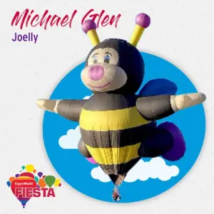 A bee-shaped hot air balloon floats against a blue sky backdrop. Branded with