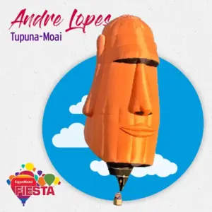 The image shows a hot air balloon designed like an Easter Island Moai statue. A person is in the basket below.