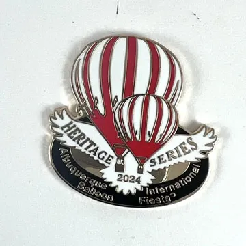 A pin featuring red and white hot air balloons, labeled "Heritage Series 2024".