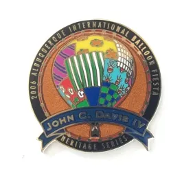 2006-Honoree-John-Davis-IV Colorful lapel pin commemorating the 2006 Albuquerque International Balloon Fiesta. Features a vibrant balloon design and the name John C. Davis IV.