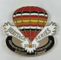 2021-Honoree-Mark-Sullivan The image shows a colorful balloon pin labeled "Heritage Series 2021" for the Albuquerque Balloon International Fiesta.